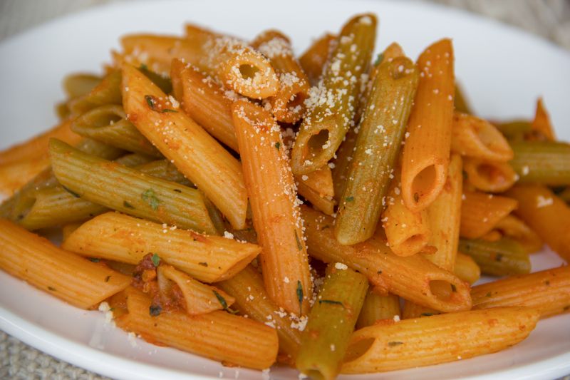 Penne arrabbiata with spicy tomato and fresh herbs