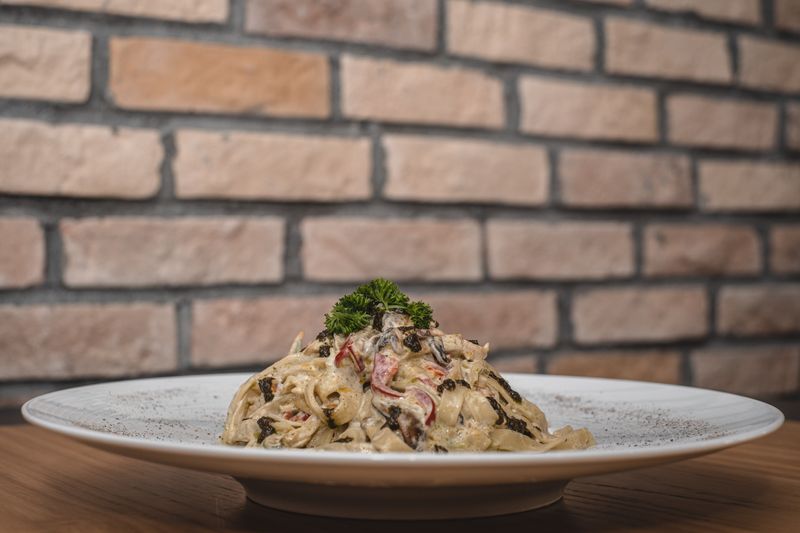 Fettuccine Alfredo with creamy butter parmesan sauce